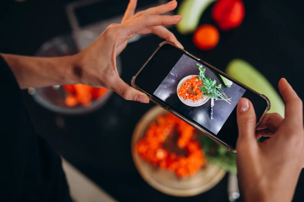 woman-making-photo-meal-her-phone